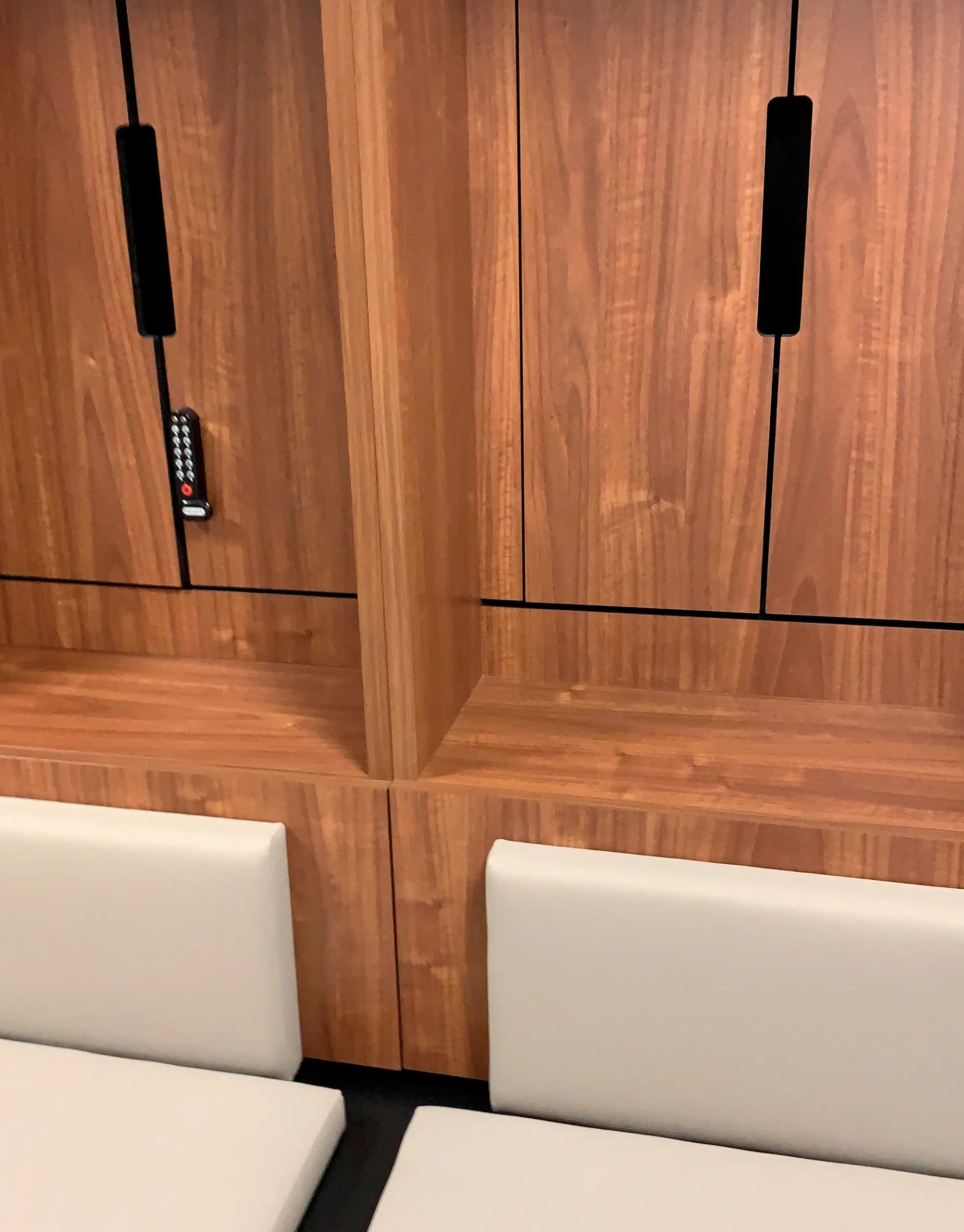 Bespoke walnut panelling and banquette seating